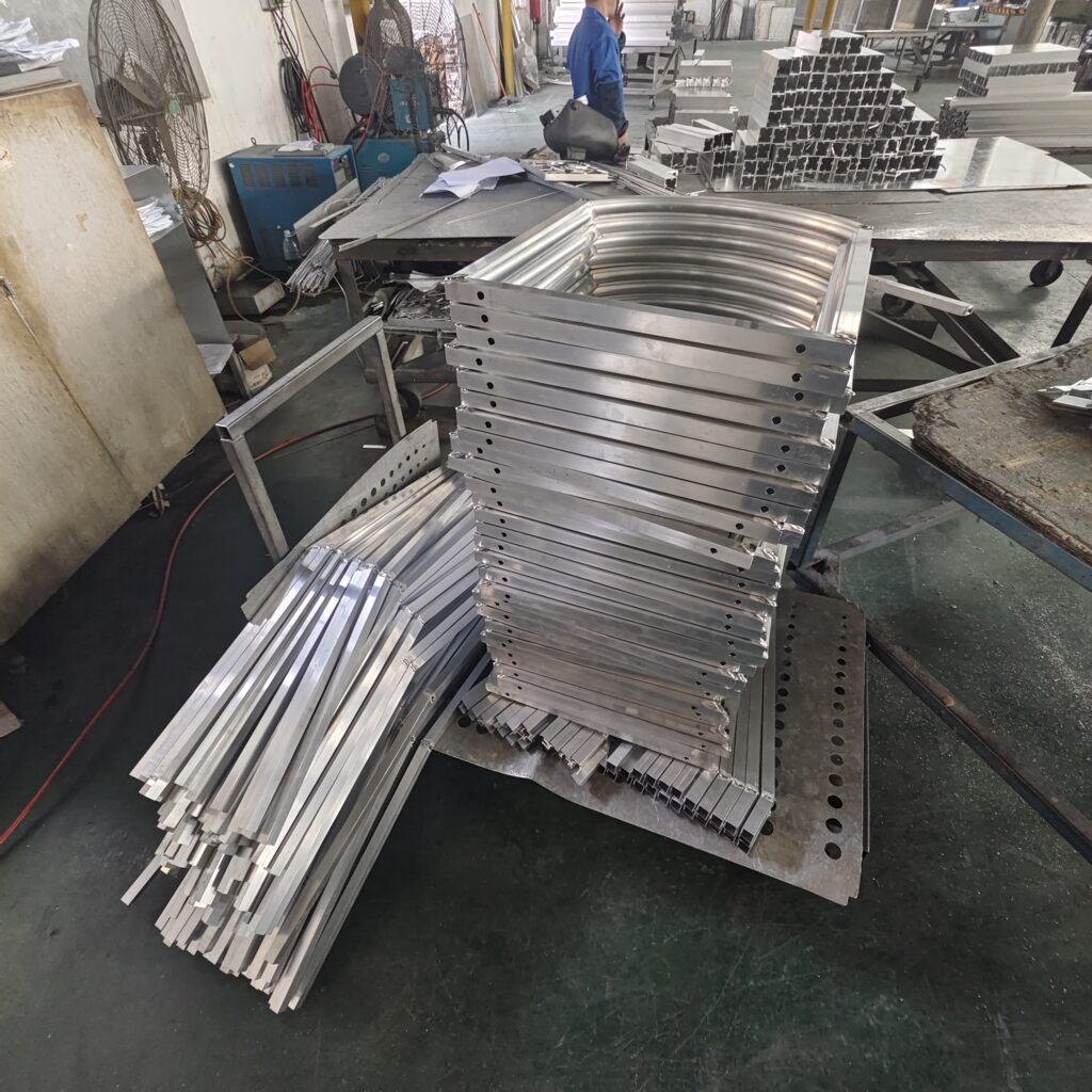 Professional TIG welding on backend structure of aluminum assembly panels.